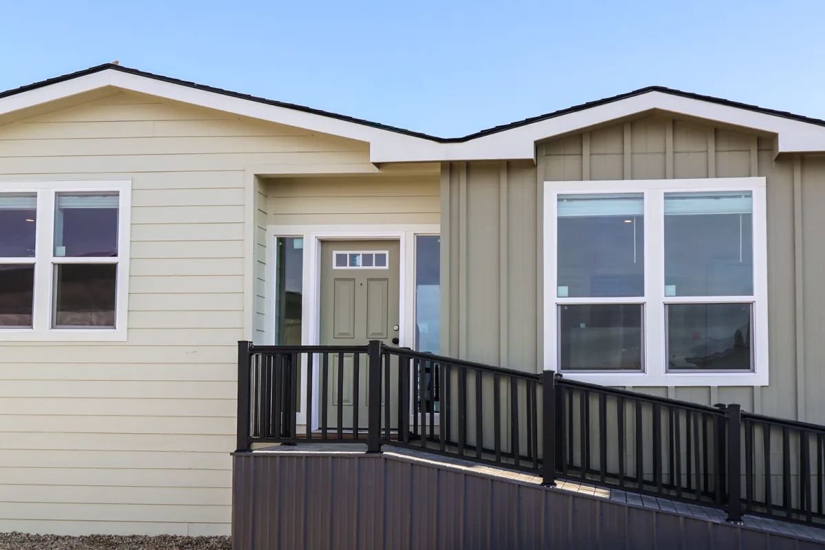 Manufactured-home exterior with a wide entry ramp