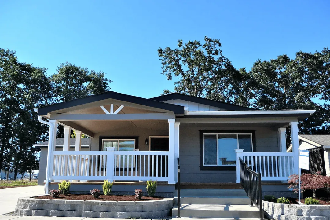 Manufactured home with a full-width covered porch