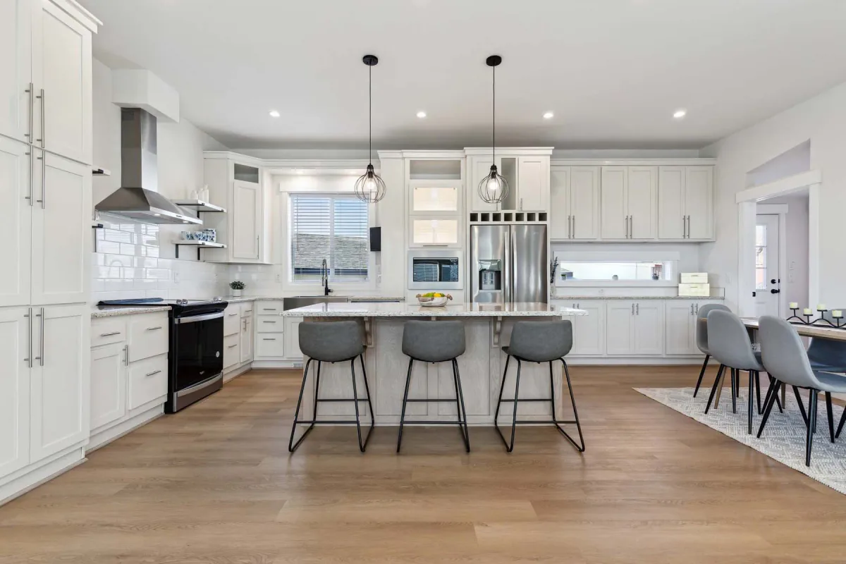Bright manufactured-home kitchen with island seating and storage