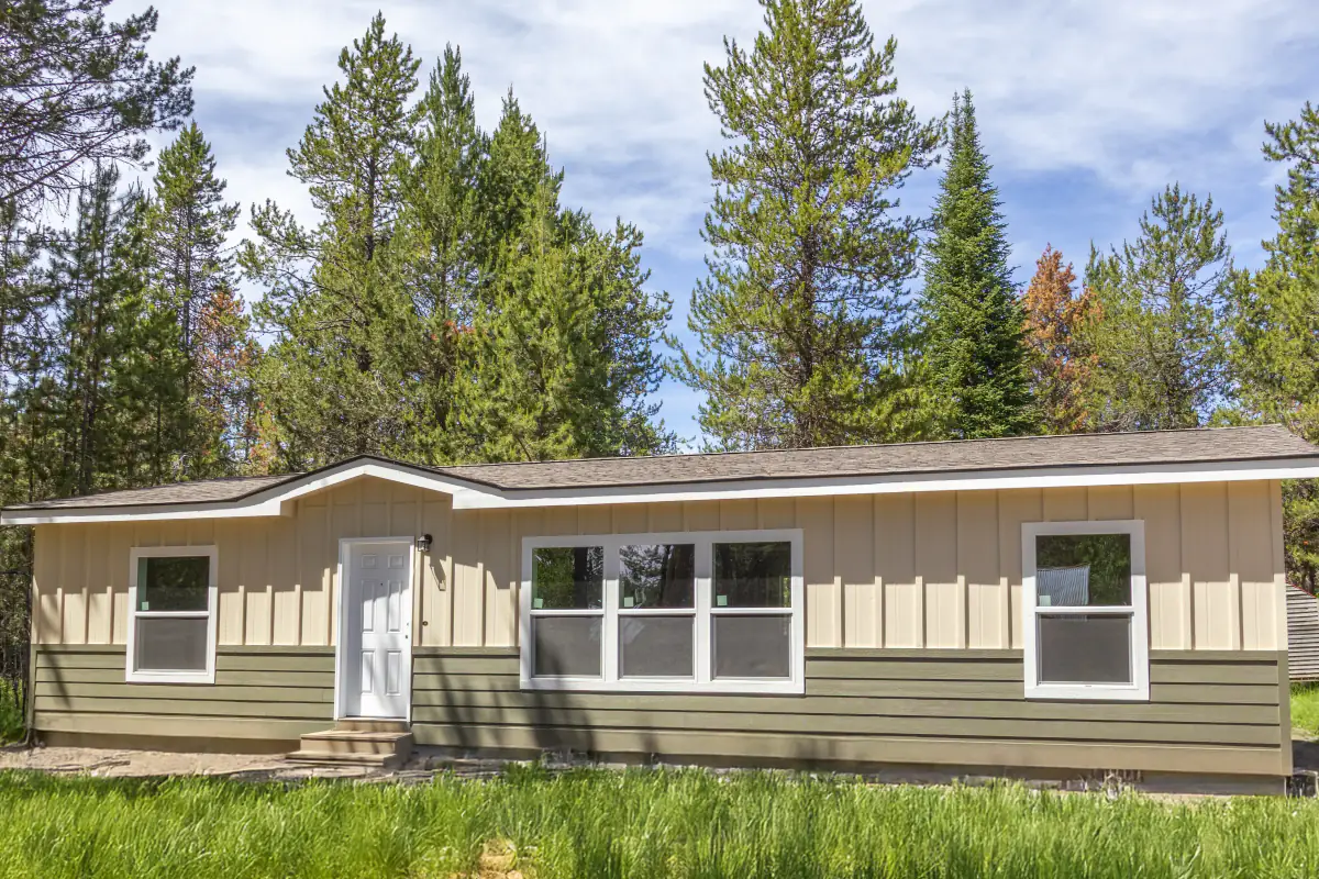 Completed single-section manufactured home with a covered entry